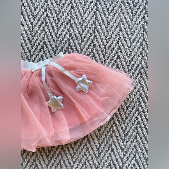 Little girls sparkly pink tool skirt with star tassels - Picture 2 of 2